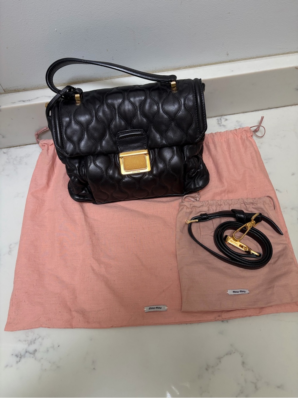 Miu Miu vintage Black Quilted Leather Top-Handle Bag with Gold Hardware